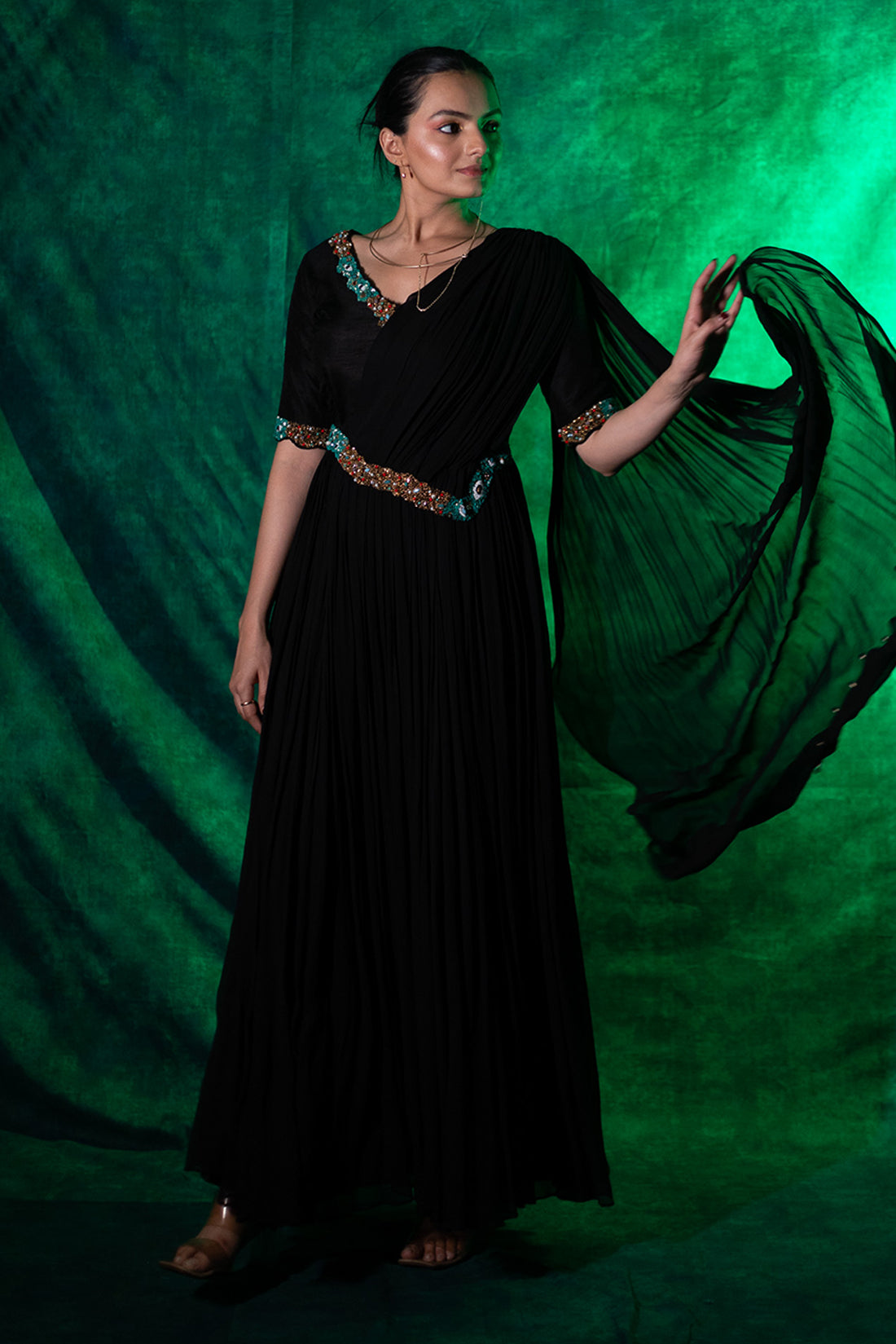 Indulge In Timeless Luxury With This Black Gown