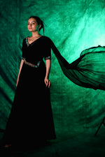 Indulge In Timeless Luxury With This Black Gown