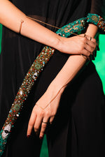 Indulge In Timeless Luxury With This Black Gown